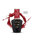 SPN Nails Gel Polish 1024 Holly Magic in a black bottle with red festive design, HEMA-free, featuring a splash of red glitter.