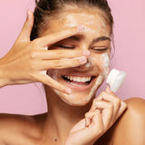 Body Boom Face Boom Cleansing Foaming Face Wash - product displayed with its packaging on a dark background