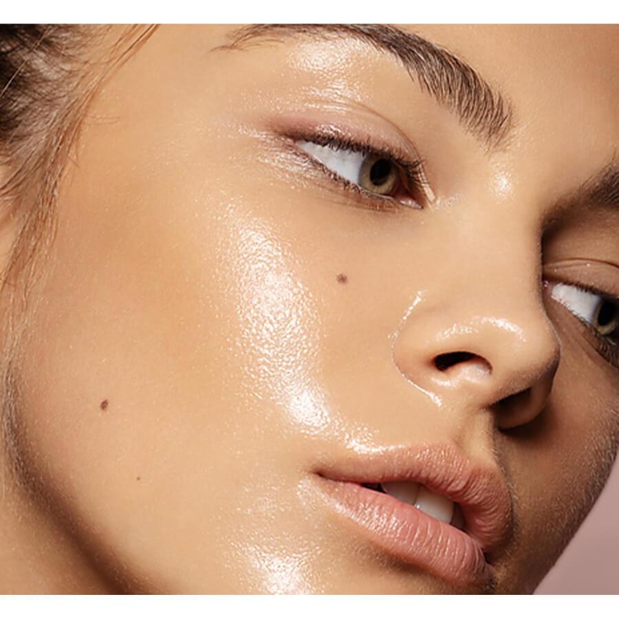 Body Boom Face Boom Corrective & Brightening Face Serum - finished result shown on a model's face