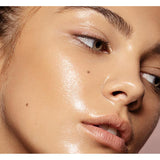 Body Boom Face Boom Corrective & Brightening Face Serum - finished result shown on a model's face