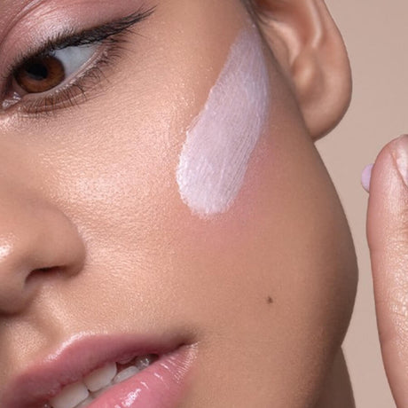 Body Boom Face Boom Makeup Base Smoothing & Moisturising - product displayed with its packaging on a dark background