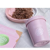 Body Boom Grape Body Scrub - displayed in a styled studio photograph
