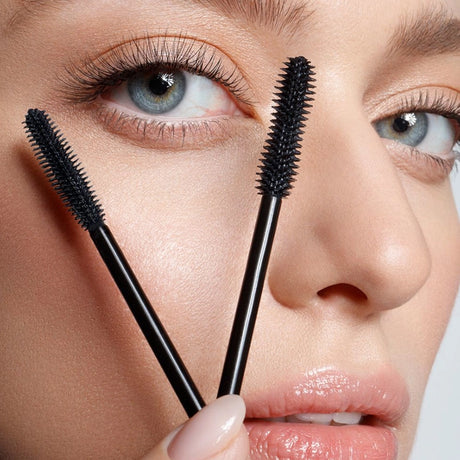 Eveline Sexy Girl 2in1 Lash Boost & Primer Black - product displayed with its packaging on a dark background