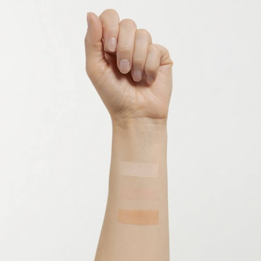 Paese Glowing Powder Illuminating Pressed Powder - shade swatches shown beside the product