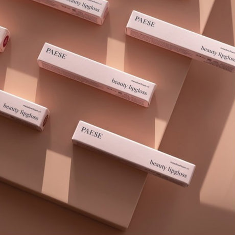 Paese Illuminating Beauty Lip Gloss - retail packaging shown on a light background