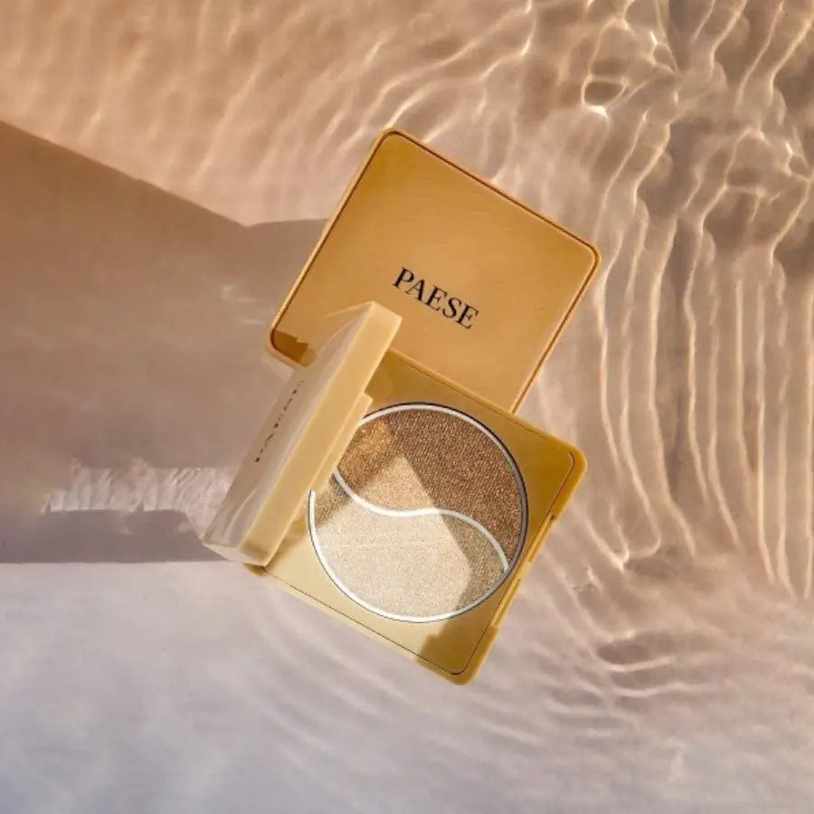 Paese Self Glow Highlighter - finished result shown on a model's face