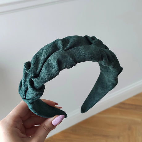 Roxie Cosmetics Bottle Green Crinkle Headband - product displayed with its packaging on a dark background