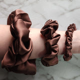 Roxie Cosmetics Luxe 100% Mulberry Silk 30 Momme Scrunchie Chocolate Brown - shade swatches shown beside the product