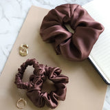 Roxie Cosmetics Luxe 100% Mulberry Silk 30 Momme Scrunchie Chocolate Brown - close-up of the product material and finish