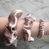 Roxie Cosmetics Luxe 100% Mulberry Silk 30 Momme Scrunchie Powder Pink - shade swatches shown beside the product